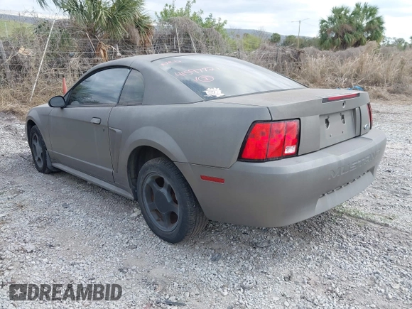 2001 Ford Mustang Standard z VIN 1FAFP40461F182730, wystawiony jako IAAI lot #41597721 z przebiegiem 160 132 mil mil oraz . Historia ofert i sprzedaży dostępna na DreamBid. Obrazek 3.