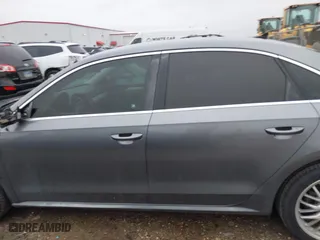 2013 Volkswagen Passat SE w/Sunroof with VIN 1VWBH7A30DC023976, listed as a IAAI auction lot 41392821 with 134,736 mi miles. Bid and sale history available at carsss.com. Image 15.