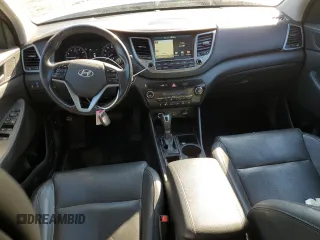 2017 Hyundai Tucson SE with VIN KM8J33A46HU519309, listed as a Copart auction lot 42677955 with 127,202 mi miles and Salvage Title. Bid and sale history available at DreamBid. Image 8.
