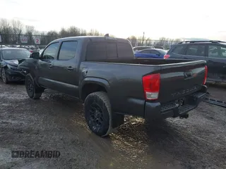 2016 Toyota Tacoma SR5 with VIN 5TFAX5GN1GX056450, listed as a IAAI auction lot 41215339 with 129,604 mi miles. Bid and sale history available at carsss.com. Image 3.
