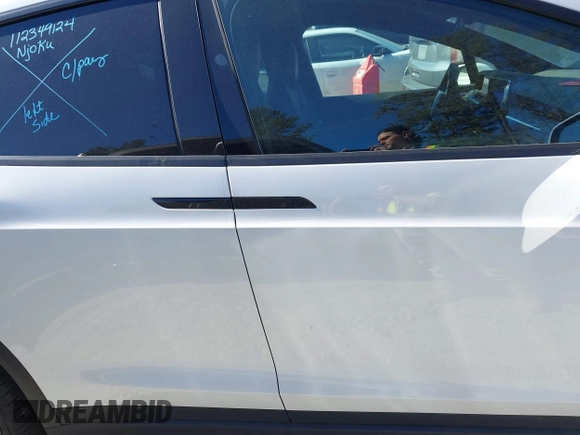 2023 Tesla Model X with VIN 7SAXCDE54PF430808, listed as a IAAI auction lot 41667924 with 21,100 mi miles and . Bid and sale history available at DreamBid. Image 13.