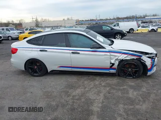 2016 BMW 3 Series GT 328i xDrive with VIN WBA8Z5C52GG502293, listed as a IAAI auction lot 42007325 with 64,659 mi miles. Bid and sale history available at carsss.com. Image 13.
