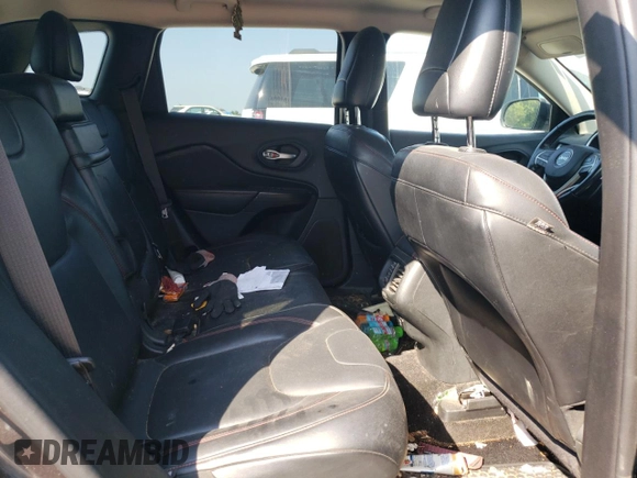2014 Jeep Cherokee Trailhawk with VIN 1C4PJMBS1EW304718, listed as a Copart auction lot 64105485 with 151,315 mi miles and Salvage title. Bid and sale history available at DreamBid. Image 11.