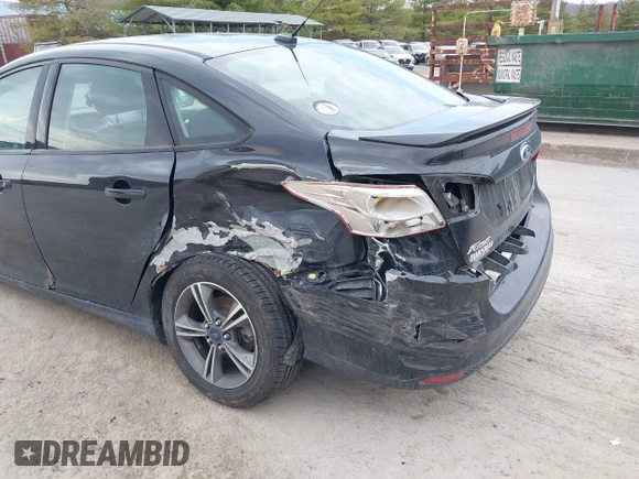 2014 Ford Focus SE with VIN 1FADP3F2XEL284465, listed as a IAAI auction lot 41903937 with 173,770 mi miles. Bid and sale history available at carsss.com. Image 6.