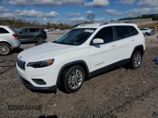 2019 Jeep Cherokee Latitude Plus with VIN 1C4PJLLNXKD119710, listed as a Copart auction lot 80502404 with 71,647 mi miles and Salvage Title. Bid and sale history available at carsss.com. Image 1.
