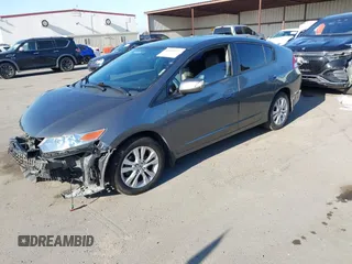 2012 Honda Insight EX z VIN JHMZE2H77CS001370, wystawiony jako IAAI lot #42312077 z przebiegiem 134 249 mil mil oraz . Historia ofert i sprzedaży dostępna na DreamBid. Obrazek 18.