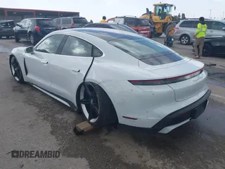 2021 Porsche Taycan Turbo z VIN WP0AC2Y16MSA63752, wystawiony jako IAAI lot #41838152 z przebiegiem 17 304 mil mil oraz . Historia ofert i sprzedaży dostępna na DreamBid. Obrazek 3.