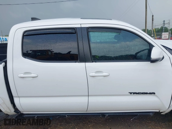 2019 Toyota Tacoma SR z VIN 3TMCZ5AN0KM232852, wystawiony jako IAAI lot #42178269 z przebiegiem 71 545 mil mil oraz . Historia ofert i sprzedaży dostępna na DreamBid. Obrazek 13.
