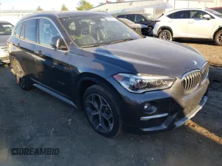 2016 BMW X1 xDrive28i with VIN WBXHT3C30GP881353, listed as a Copart auction lot 65233532 with 52,036 mi miles. Bid and sale history available at carsss.com. Image 1.
