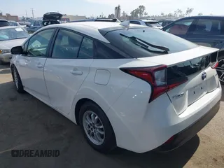 2022 Toyota Prius L Eco z VIN JTDKAMFU6N3177732, wystawiony jako IAAI lot #42504790 z przebiegiem 65 338 mil mil oraz . Historia ofert i sprzedaży dostępna na DreamBid. Obrazek 3.