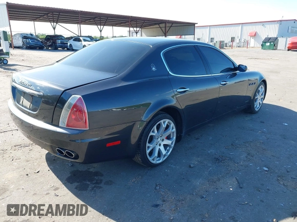 2007 Maserati Quattroporte with VIN ZAMFE39A070029397, listed as a IAAI auction lot 42027798 with 95,978 mi miles. Bid and sale history available at carsss.com. Image 4.