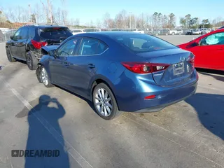 2017 Mazda 3 Touring with VIN 3MZBN1V74HM104034, listed as a IAAI auction lot 41823286 with 53,282 mi miles and . Bid and sale history available at DreamBid. Image 3.