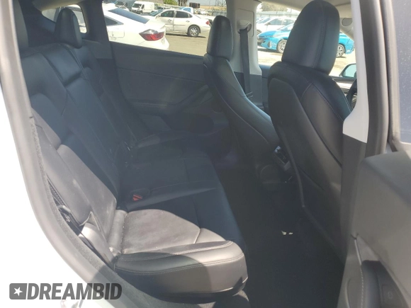 2024 Tesla Model Y Long Range с VIN 7SAYGDEE6RF157415, выставлен на аукционе Copart как лот 54950915 с пробегом 20 567 миль миль и Списание • Salvage title. История ставок и продаж доступна на DreamBid. Изображение 10.