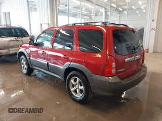 2006 Mazda Tribute S with VIN 4F2YZ06196KM14531, listed as a IAAI auction lot 41594920 with 297,204 mi miles and . Bid and sale history available at carsss.com. Image 3.
