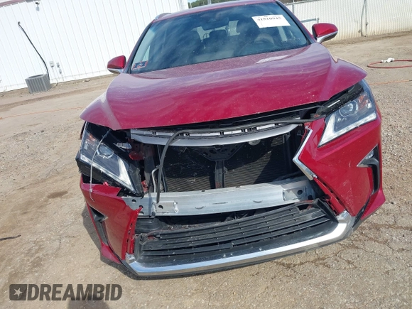 2018 Lexus RX 350L Premium with VIN JTJDZKCA3J2004828, listed as a IAAI auction lot 41810945 with 51,687 mi miles and . Bid and sale history available at DreamBid. Image 6.
