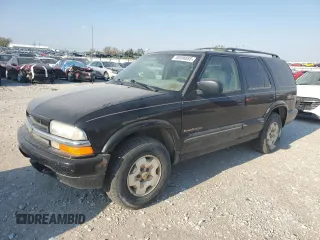 1999 Chevrolet Blazer Trailblazer z VIN 1GNDT13W2X2130625, wystawiony jako Copart lot #50596885 z przebiegiem 187 444 mil mil oraz Czysty tytuł • Clean title. Historia ofert i sprzedaży dostępna na DreamBid. Obrazek 1.