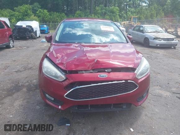 2015 Ford Focus SE z VIN 1FADP3F25FL313033, wystawiony jako IAAI lot #42206507 z przebiegiem 142 938 mil mil oraz . Historia ofert i sprzedaży dostępna na DreamBid. Obrazek 6.