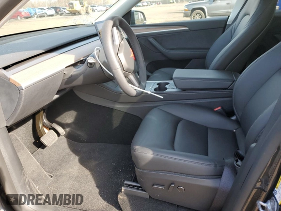 2025 Tesla Model Y Long Range with VIN 7SAYGDEE4SF291068, listed as a Copart auction lot 51204615 with 2,958 mi miles and Salvage Title. Bid and sale history available at DreamBid. Image 7.
