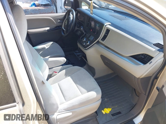 2015 Toyota Sienna LE AAS with VIN 5TDKK3DCXFS552524, listed as a IAAI auction lot 42060065 with 249,332 mi miles and . Bid and sale history available at DreamBid. Image 5.