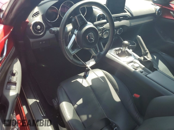 2020 Mazda MX-5 Miata Grand Touring z VIN JM1NDAD79L0415751, wystawiony jako Copart lot #71864574 z przebiegiem Nie podano mil oraz Szkoda całkowita • Salvage title. Historia ofert i sprzedaży dostępna na DreamBid. Obrazek 8.
