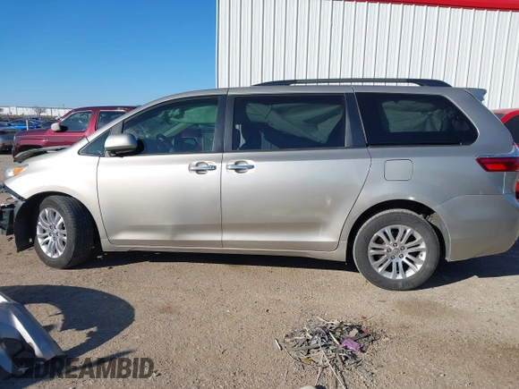 2015 Toyota Sienna XLE with VIN 5TDYK3DC8FS547056, listed as a IAAI auction lot 41387793 with 140,767 mi miles and . Bid and sale history available at DreamBid. Image 15.