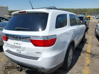 2013 Dodge Durango Crew with VIN 1C4RDHDG8DC698668, listed as a IAAI auction lot 41876841 with 160,012 mi miles and . Bid and sale history available at DreamBid. Image 4.