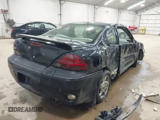 2005 Pontiac Grand Am GT with VIN 1G2NW12E85M140434, listed as a IAAI auction lot 41966294 with 142,548 mi miles. Bid and sale history available at carsss.com. Image 4.