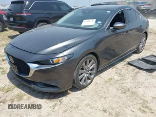 2021 Mazda 3 Preferred with VIN JM1BPACL1M1317639, listed as a IAAI auction lot 41939340 with 51,195 mi miles and . Bid and sale history available at DreamBid. Image 2.