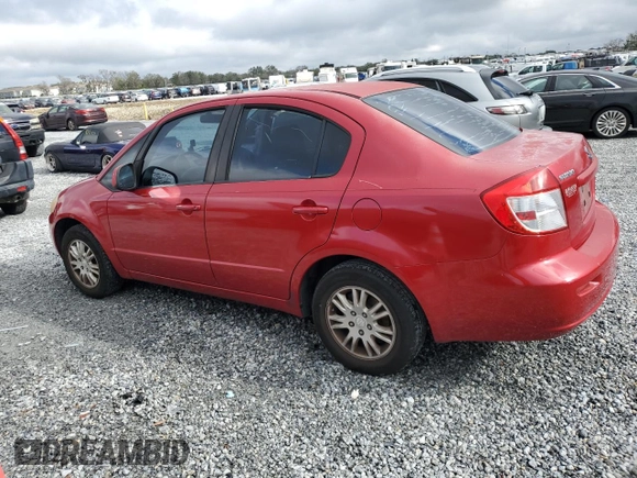 2012 Suzuki SX4 LE with VIN JS2YC5A39C6300577, listed as a Copart auction lot 86998944 with 103,354 mi miles and Non Repairable. Bid and sale history available at carsss.com. Image 2.