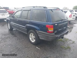 2002 Jeep Grand Cherokee Laredo with VIN 1J4GW48S22C244433, listed as a IAAI auction lot 41892912 with 256,393 mi miles. Bid and sale history available at carsss.com. Image 3.