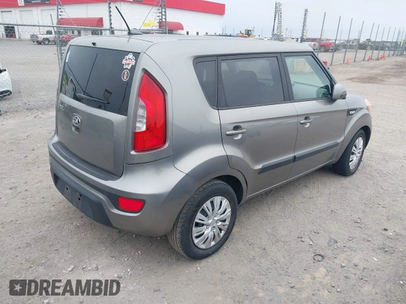 2013 Kia Soul with VIN KNDJT2A53D7636040, listed as a IAAI auction lot 40979461 with 122,530 mi miles. Bid and sale history available at carsss.com. Image 4.