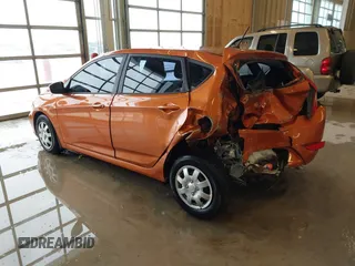 2015 Hyundai Accent GS with VIN KMHCT5AE6FU211955, listed as a IAAI auction lot 41610857 with 106,497 mi miles. Bid and sale history available at carsss.com. Image 3.