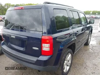 2014 Jeep Patriot Latitude with VIN 1C4NJRFB3ED661196, listed as a IAAI auction lot 42338511 with 101,686 mi miles and . Bid and sale history available at DreamBid. Image 4.