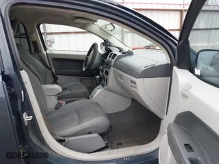 2007 Dodge Caliber SXT with VIN 1B3HB48B77D330653, listed as a IAAI auction lot 41527364 with 218,823 mi miles. Bid and sale history available at carsss.com. Image 5.