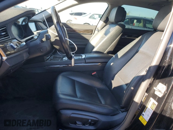 2015 BMW 7 Series 740Li with VIN WBAYE4C55FD947214, listed as a Copart auction lot 87261354 with 393,256 mi miles and Salvage Title. Bid and sale history available at DreamBid. Image 7.