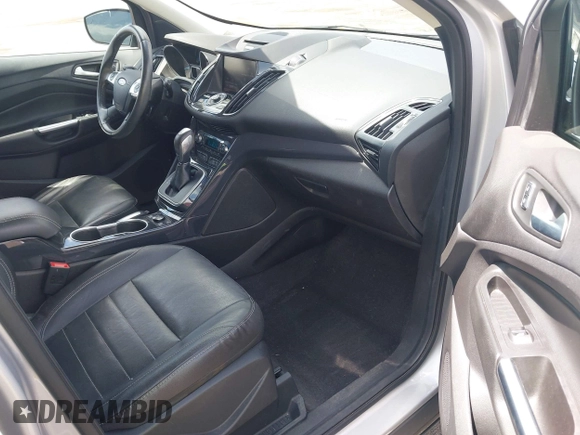 2014 Ford Escape Titanium with VIN 1FMCU0JX7EUA28824, listed as a IAAI auction lot 42065325 with 107,761 mi miles. Bid and sale history available at carsss.com. Image 5.
