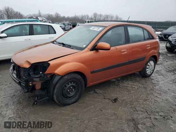 2009 Kia Rio LX with VIN KNADE243396530327, listed as a Copart auction lot 44631785 with 123,170 mi miles and Salvage Title. Bid and sale history available at carsss.com. Image 1.