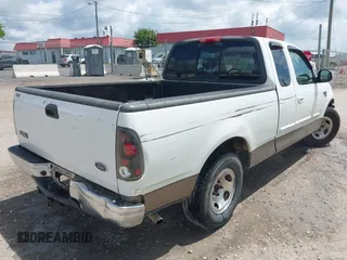 2002 Ford F-150 XL with VIN 1FTRX17W22NB88707, listed as a IAAI auction lot 42687327 with 185,481 mi miles and . Bid and sale history available at DreamBid. Image 4.