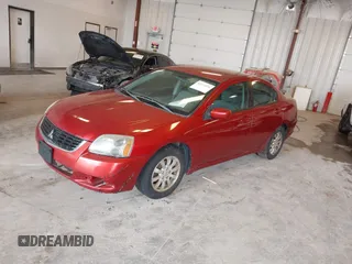 2009 Mitsubishi Galant ES z VIN 4A3AB36FX9E043141, wystawiony jako IAAI lot #42273376 z przebiegiem 242 378 mil mil oraz . Historia ofert i sprzedaży dostępna na DreamBid. Obrazek 2.
