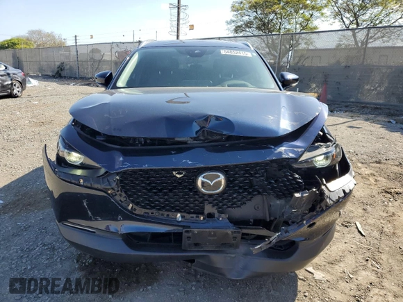 2023 Mazda CX-30 S Premium with VIN 3MVDMBDM7PM543849, listed as a Copart auction lot 54852415 with 20,898 mi miles and Salvage title. Bid and sale history available at DreamBid. Image 5.