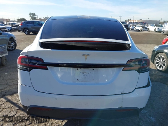 2022 Tesla Model X with VIN 7SAXCBE56NF329657, listed as a IAAI auction lot 41400629 with Not Provided miles and . Bid and sale history available at DreamBid. Image 17.