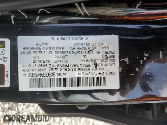 2011 Mazda CX-7 i SV z VIN JM3ER2AMXB0396845, wystawiony jako Copart lot #52347865 z przebiegiem 171 487 mil mil oraz Szkoda całkowita • Salvage title. Historia ofert i sprzedaży dostępna na DreamBid. Obrazek 13.
