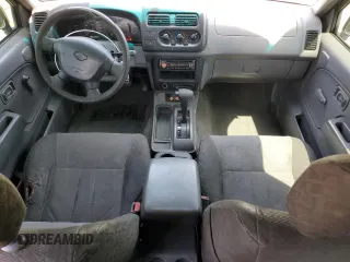 2001 Nissan Xterra XE with VIN 5N1ED28T71C509969, listed as a Copart auction lot 62353085 with 292,763 mi miles and Salvage title. Bid and sale history available at DreamBid. Image 8.