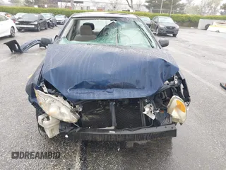 2004 Toyota Corolla CE with VIN 1NXBR32E84Z279684, listed as a IAAI auction lot 41922843 with Not Provided miles. Bid and sale history available at carsss.com. Image 12.