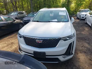 2022 Cadillac XT6 Premium Luxury z VIN 1GYKPDRS3NZ124924, wystawiony jako IAAI lot #42215418 z przebiegiem 32 368 mil mil oraz . Historia ofert i sprzedaży dostępna na DreamBid. Obrazek 12.
