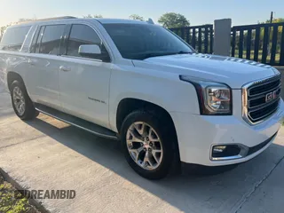 2016 GMC Yukon XL SLE with VIN 1GKS1FKC4GR126775, listed as a Copart auction lot 52828325 with 110,002 mi miles and Clean Title. Bid and sale history available at carsss.com. Image 1.
