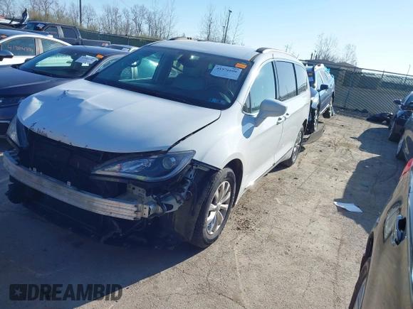 2017 Chrysler Pacifica Touring L with VIN 2C4RC1BG8HR677720, listed as a IAAI auction lot 41976606 with 170,175 mi miles and . Bid and sale history available at DreamBid. Image 18.