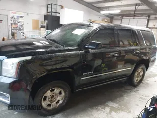 2015 GMC Yukon Denali with VIN 1GKS2CKJ4FR173703, listed as a IAAI auction lot 41943537 with 167,834 mi miles. Bid and sale history available at carsss.com. Image 14.