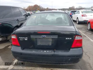 2005 Ford Focus S with VIN 1FAFP34N75W304479, listed as a IAAI auction lot 41117405 with 234,312 mi miles. Bid and sale history available at carsss.com. Image 16.