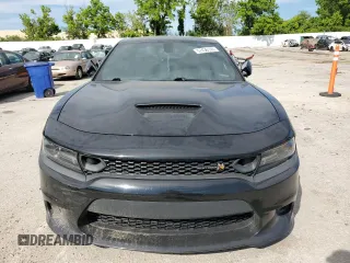 2019 Dodge Charger Scat Pack с VIN 2C3CDXGJ7KH579130, выставлен на аукционе Copart как лот 57436195 с пробегом 116 644 миль миль и Списание • Salvage title. История ставок и продаж доступна на DreamBid. Изображение 5.